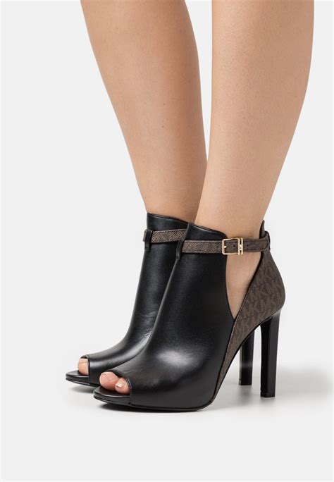 michael kors black heel boots|brown waterproof michael kors boots.